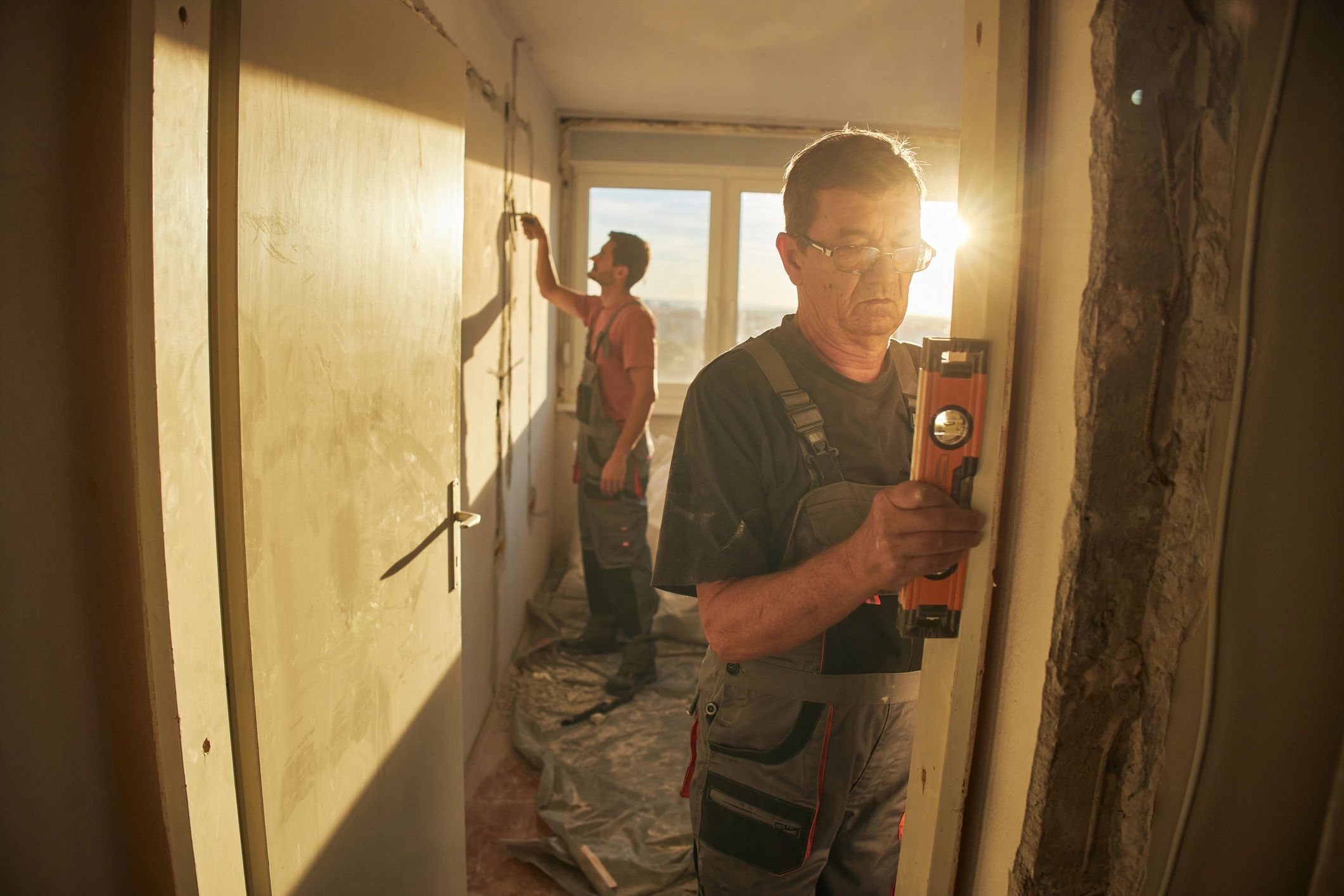 Workers completing interior home maintenance